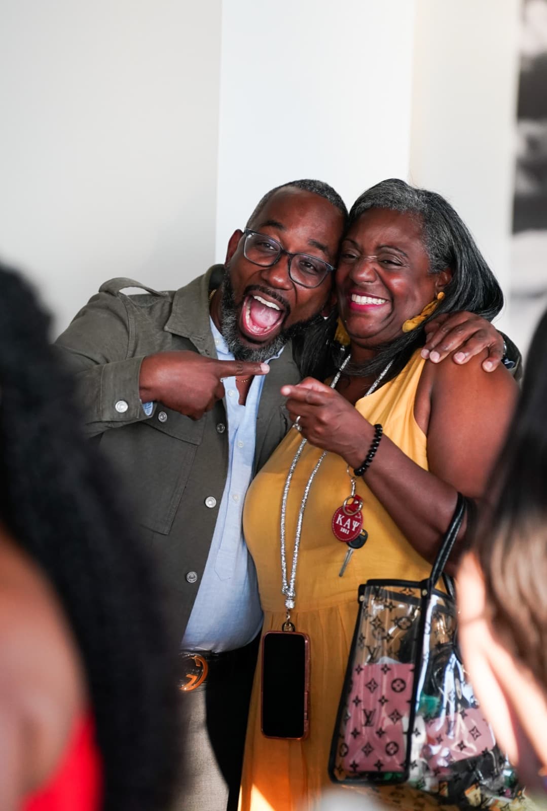 Two guests laughing together